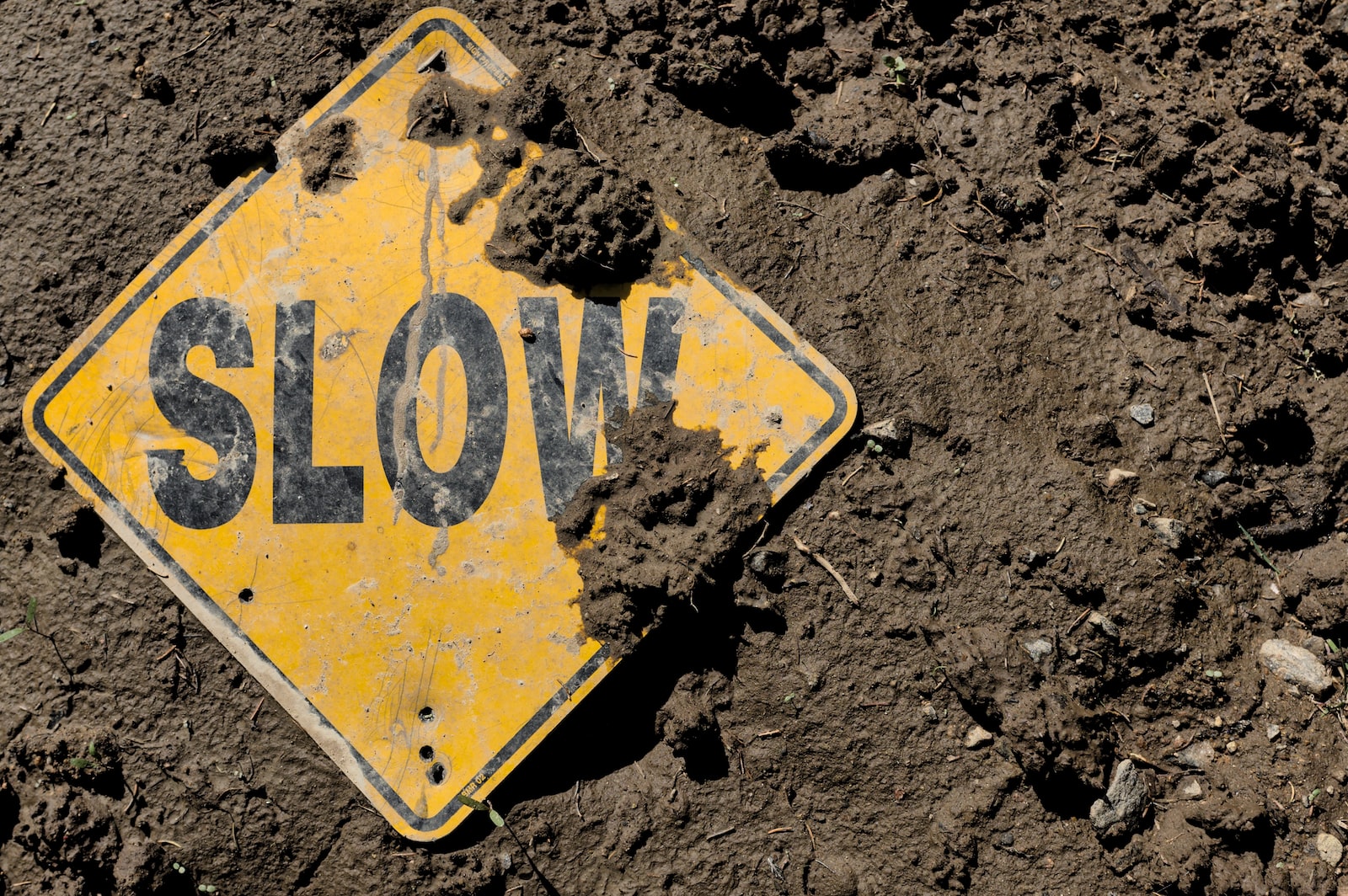 slow sign in dirt